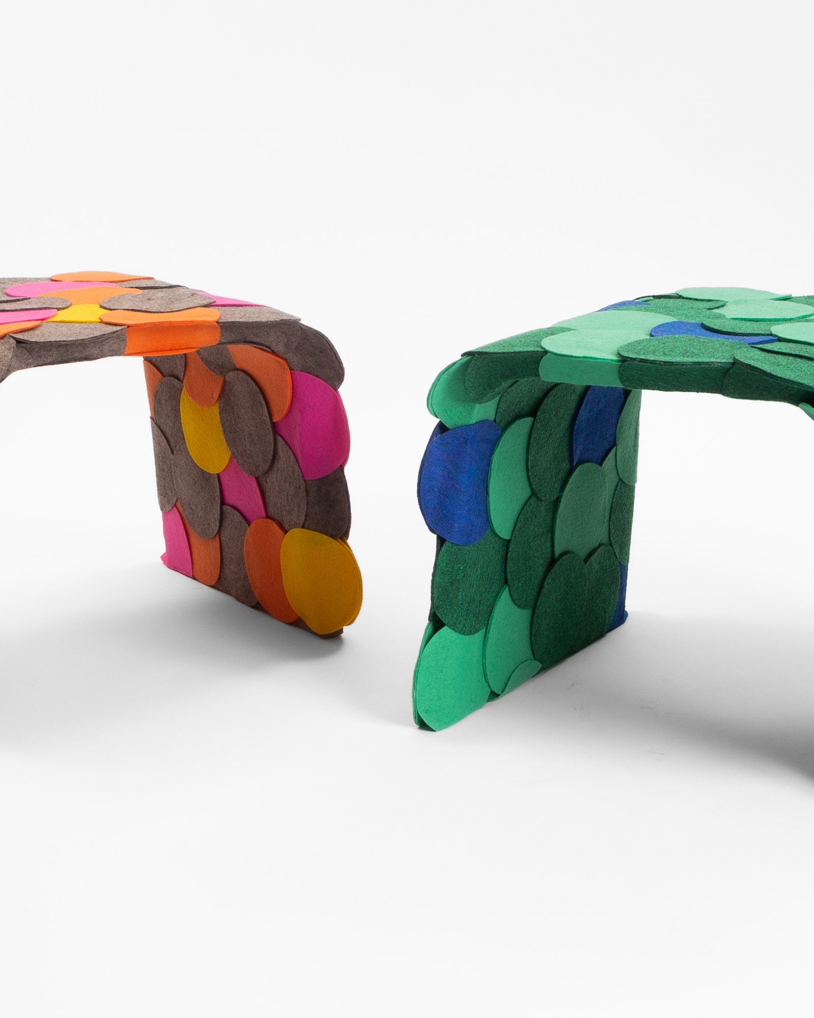 Detail of two Escama stools, multicolour and green