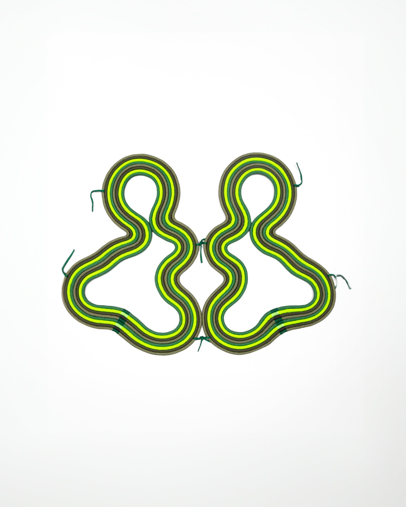 Two green Lava rope shells, flat lay