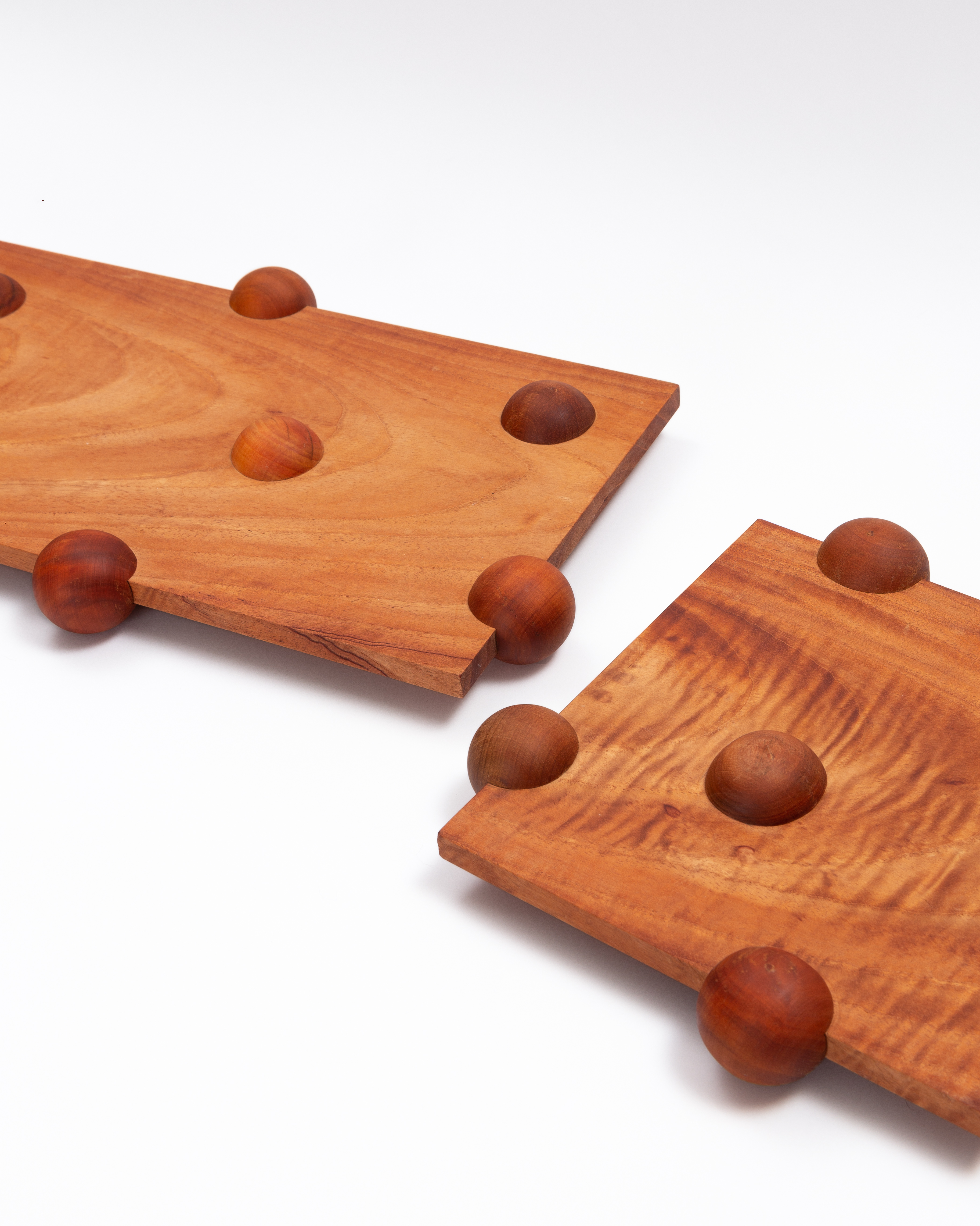 Detail of two boards and their wooden feet